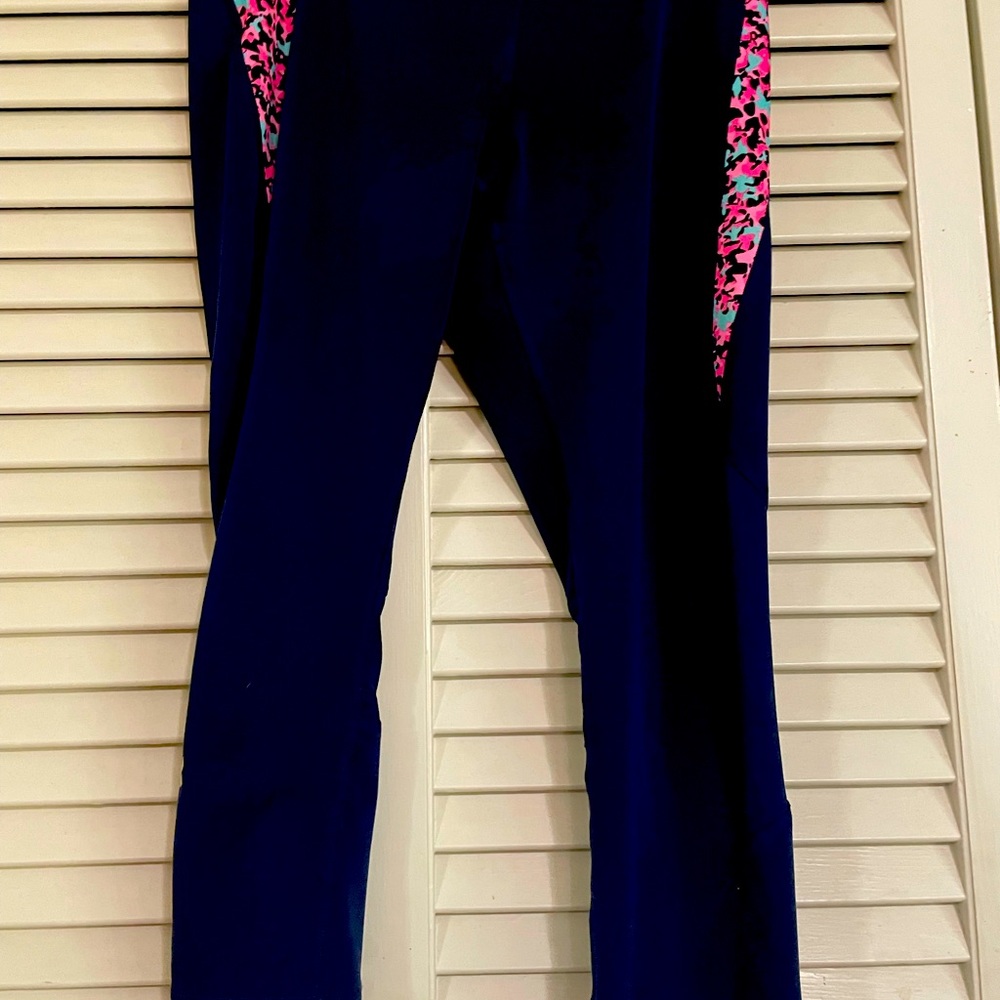 Under armor navy leggings and royal blue and black and white zig zag
